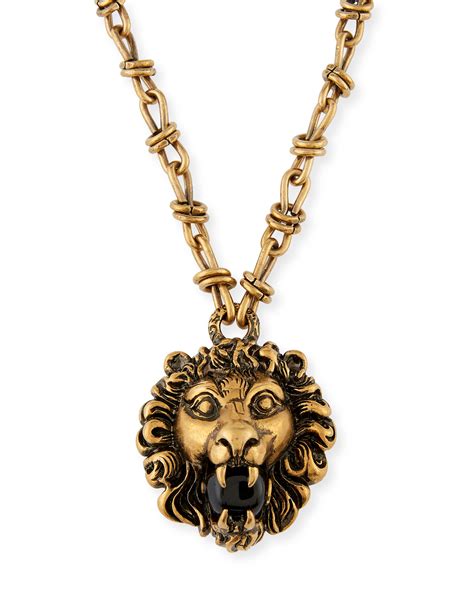 gucci lion head necklace.